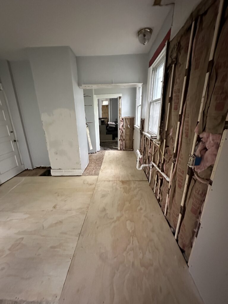 Finished kitchen subfloor with lauan underlayment